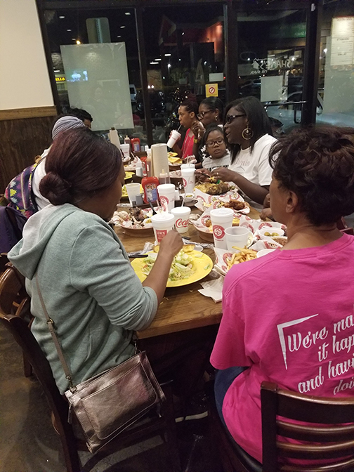 Members of the Alabama affiliate enjoy a barbeque dinner together after their first successful walkathon.